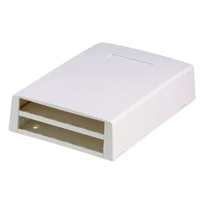 Caja de Montaje en Superficie, con Accesorio para Resguardo de Fibra Óptica, para 12 Módulos Mini-Com, Color Blanco
