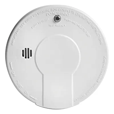 Alarma de humo por ionización 120 VAC/DC con respaldo de batería 9V, interconectable hasta 24 dispositivos, botón único Hush y prueba