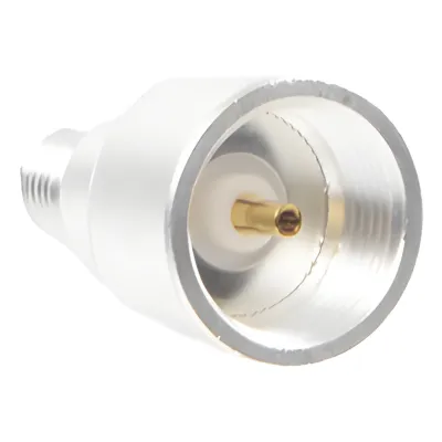 Adaptador UNIDAPT Hembra a SMA Hembra Inverso. Plata / Oro / Teflón.