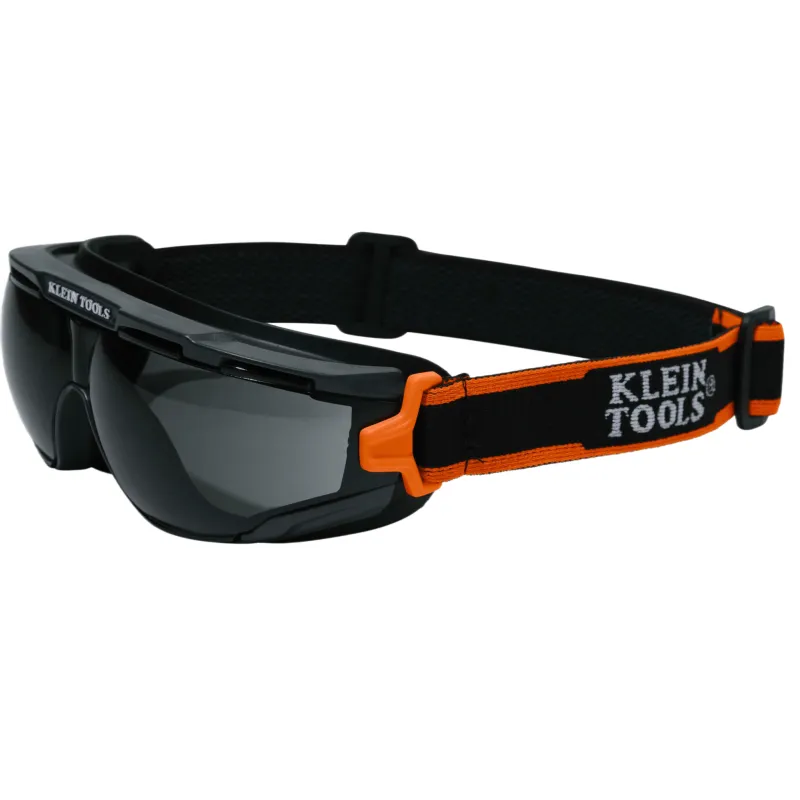Gafas de Seguridad Compactas / Cristales Sombreados Grises / ANSI Z87.1+ D3 D4 y CSA Z94.3 / Claridad Óptica Clase 1 / Protección UV 99.9% / Rejillas Antivaho / Correa con Agarres de Silicona / Policarbonato